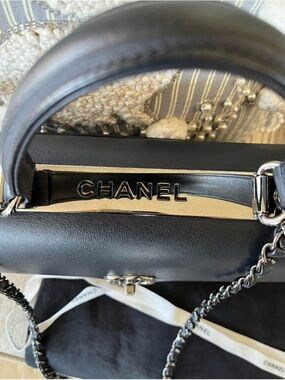 CHANEL Black Leather Satchel with Silver Hardware